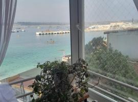 departamento vistas a pasos playa caleuche, ξενοδοχείο σε Κιντέρο