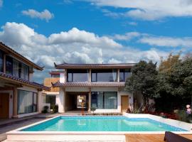 Lijiang Jinghua Inn, hotel com piscina em Lijiang