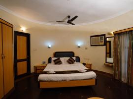 Greencoconutresort, hotel v destinaci Navalur