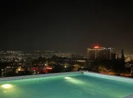 Affordable Luxury Studio with Free Pool, Gym and Office next to Convention Center