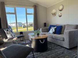Ferienhaus mit Meerblick Nr46 direkt am Wattenmeer, Hotel in Westerland