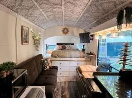 Rustic Converted School Bus with Outdoor Shower Near ORV Trails in Manistee National Forest, Michigan