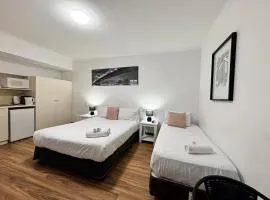 city staycation studio with 2 beds