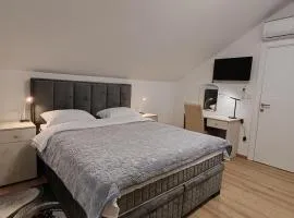 Rooms DM - Una