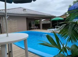Casa Aconchegante com piscina no litoral do Paraná em Matinhos