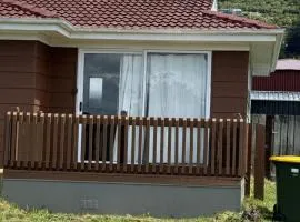 2 Double Beds, 1 Single Bed, 1 Double Sofa Bed in a small 1 bedroom and 1 lounge Studio No Kitchen Only fridge, microwave