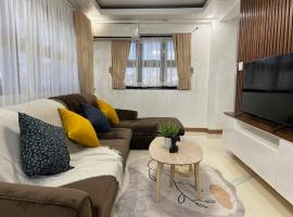 Aloha - Your Stylish City Escape, hotel con bañera de hidromasaje en Gate