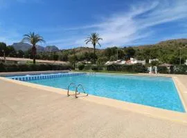 Casita con piscina comunitaria