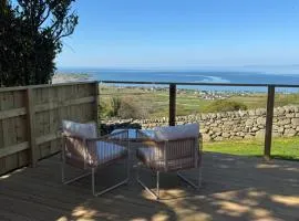 coastal view shepherds hut with hot tub