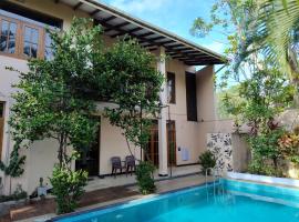 A tropical paradise; stunning house, pool, garden