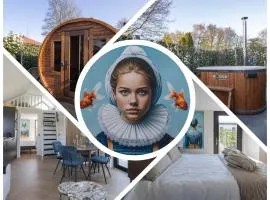 Tiny Wellness House in Heinkenszand with a private sauna, hottub, garden, airco, free wifi, boutique design and a luxury wellness experience