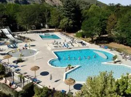 Camping La Grand'Terre 4 étoiles - Linge de maison inclus - Clim - TV - Plancha - Lave-vaisselle - 4 personnes 2 chambres