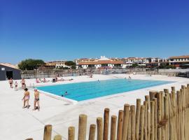 La Coudalère - Piscines - Climatisation - Aire de jeux d'enfants - Parking - Commerce - Animation - Vue magnifique, hotel a Le Barcarès