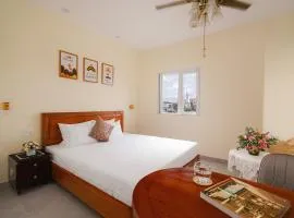CandlePine Suites - Khách sạn căn hộ