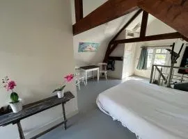 Het Koetshuis