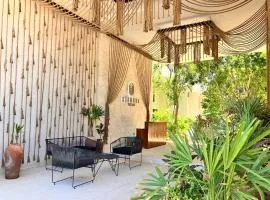 Tulum groups home for 7 guest with 2 bedrooms Balcony Common Pool Gym Yoga and mini Market Ximbal