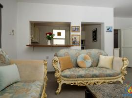 Cozy Studio Chalets, hotel in Madīnat an Nahḑah