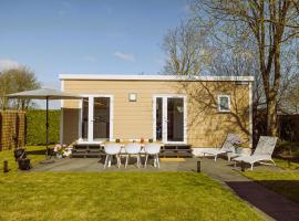 De Frije Fûgel - Een luxe chalet op De Friese Wadden, σαλέ σε Tzummarum