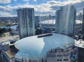 Modern High-Rise 1 Bedroom Condo with water view near stadiums, hotel v destinaci Vancouver