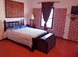 Cuarto tipo loft con terraza