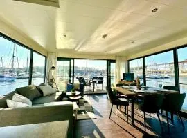 Exklusives Ostsee-Hausboot, Küche mit Spüler, Tv, große Sonnenterrasse, 3x kostenfreie Kfz-Parkplätze, Klimaanlage, bis zu 6 Personen, 2x Bäder, Waschmaschine