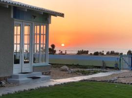 Quaint Seaside Cottage, casa de campo em Swakopmund