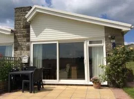 Cliff End Self catering bungalow with sea views in beautiful rural West Wight Free WiFi and ferry offers available Short walk to beach