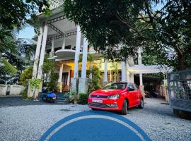 Thottungal Homestay, hotel con tinas de hidromasaje en Ernakulam