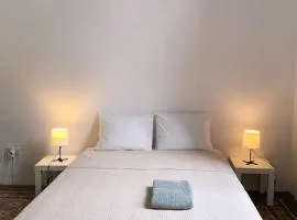 Small Double Room in Shared Colonial Guesthouse