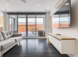 Coastal Getaway with Parking and Steps from the Beach