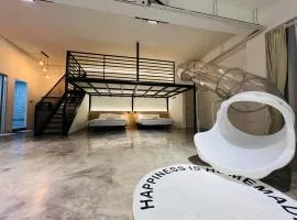 the Zwei Playhouse Retreat with Slide at the Frohaus