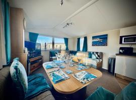 Cosy Quiet Caravan By The Sea, glamping site in Dinas