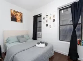 Oasis Room at a Shared Apartment by Times Square