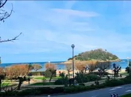 Habitaciones privadas en piso frente a playa Ondarreta, baño compartido