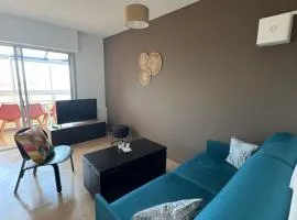 Appartement Cosy Parking, Plage & Commerces à Deux Pas