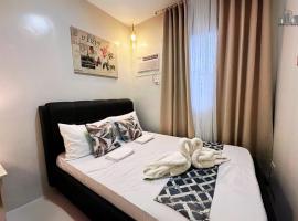 Puerto Princesa 2BR Condo Resort style with Bunkbed, Balcony Condo Near PPC Airport up to 5pax - B2 4Kunzite – hotel w mieście Puerto Princesa