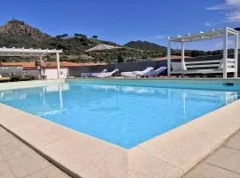 Attico con piscina pivata a Porto Azzurro