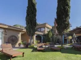 Capital O La Huerta Golf & Hotel