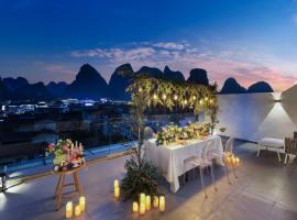 Yangshuo QingQing Riverside Inn, hotel v destinaci Jang-šuo