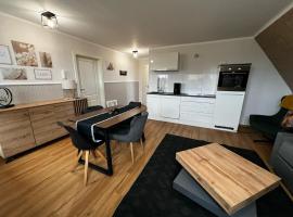 Haus-Fehmarn-am-Dorfteich-|-Wohnung-1-Sued, апартаменти у місті Фемарн