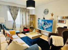 Modern Home with Private Lawn, BBQ & Free Parking in Peaceful Area