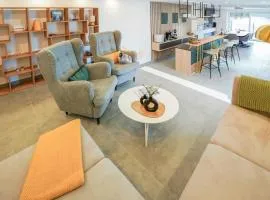 SEEZEIT Ferienwohnungen & Seminarhaus am Ammersee