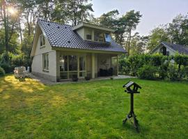 Vakantiewoning Bosvogel, hotel i Holten