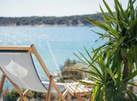 Raža - Beachfront apartment with boat dock