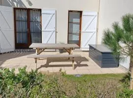 Entre mer et golf Appartement en rez de jardin avec parking