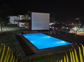 plumeria Retreat pawna lakeside cottages, намет-люкс у місті Лонавла