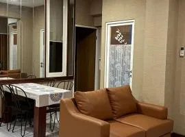 Apt 09 Puncak Dharmahusada 3BR Free Wifi Netflix