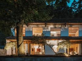 YunXi ChanYi Hot Spring Hotel, huisdiervriendelijk hotel in Emeishan