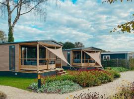 Trinity Lodges 12 people, hotel i Voorthuizen
