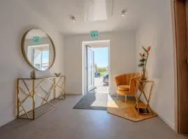 SCHLOSSBERG RESIDENCES - Self Check-In Studios mit Küche am Bodensee & Spieleland